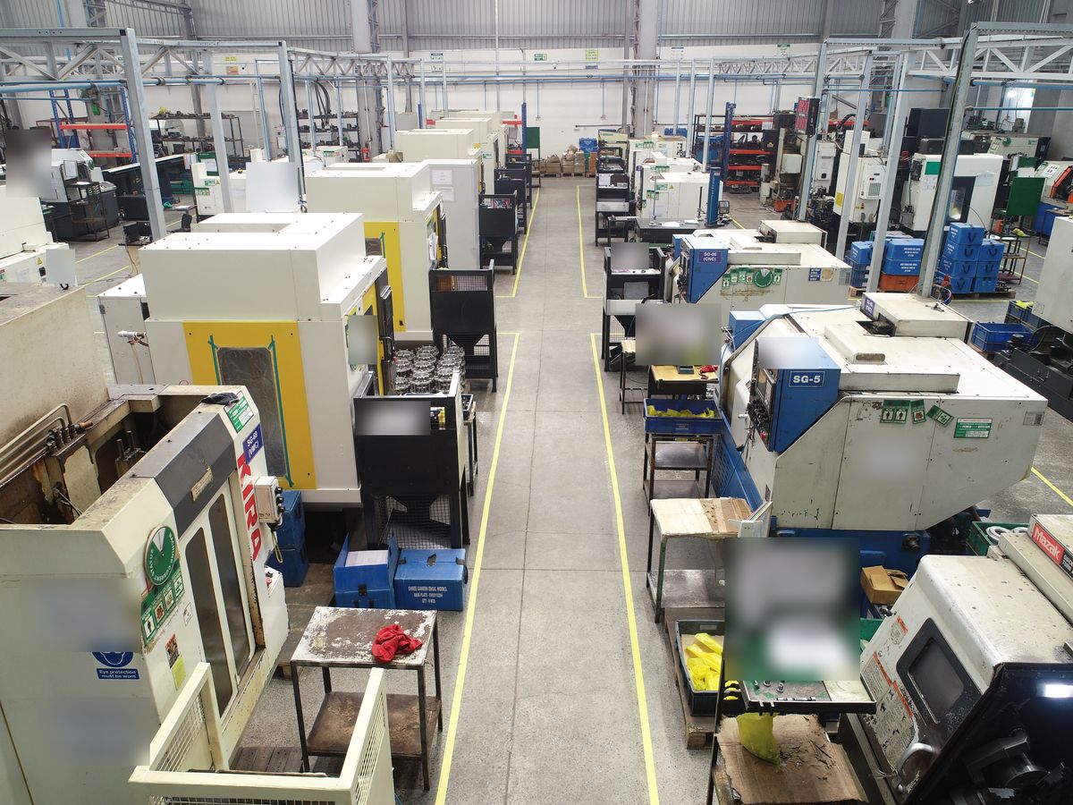 Machining aisle with CNC turning centres and vertical machining centres